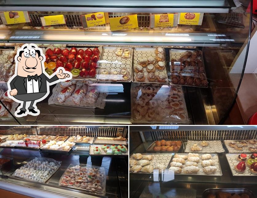 Guarda la foto che mostra la interni e cibo di Pasticceria Voglia Matta