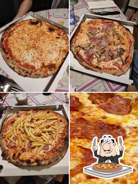 A La Bottega della Pizza, puoi goderti una bella pizza