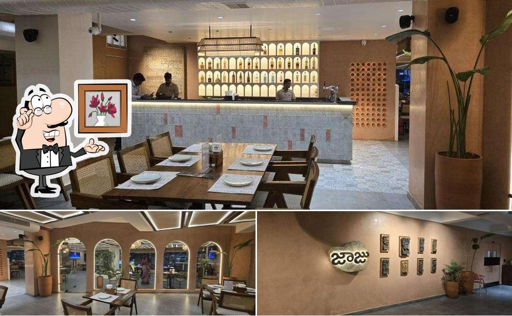 Take a seat at one of the tables at Jaaju Kitchen & Bar