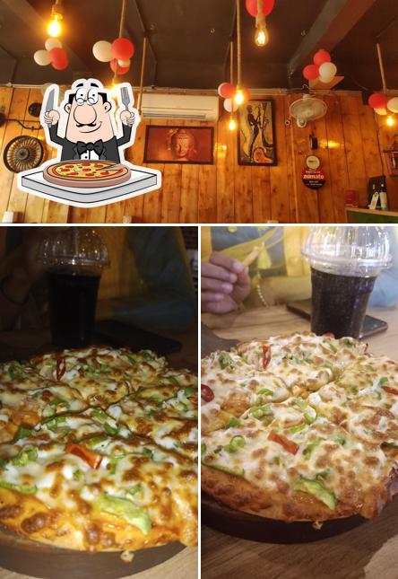 At The Grill House Cafe, you can get pizza