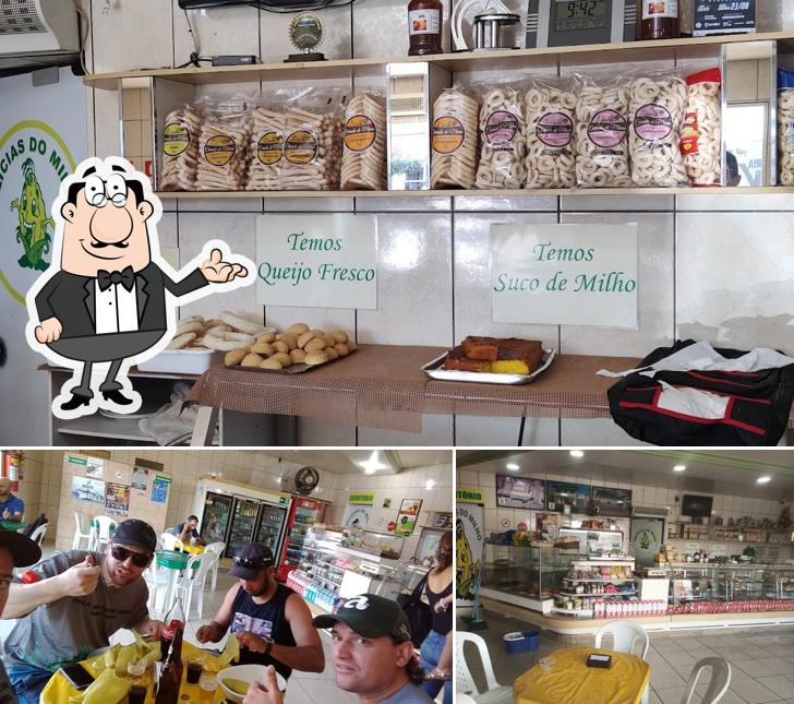 Sente em uma das mesas no Delícias do Milho - Pamonharia e Padaria