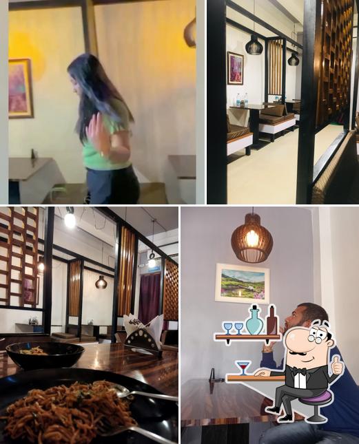 Take a seat at one of the tables at Bawarchi Kafyh