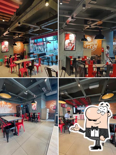 Take a seat at one of the tables at KFC