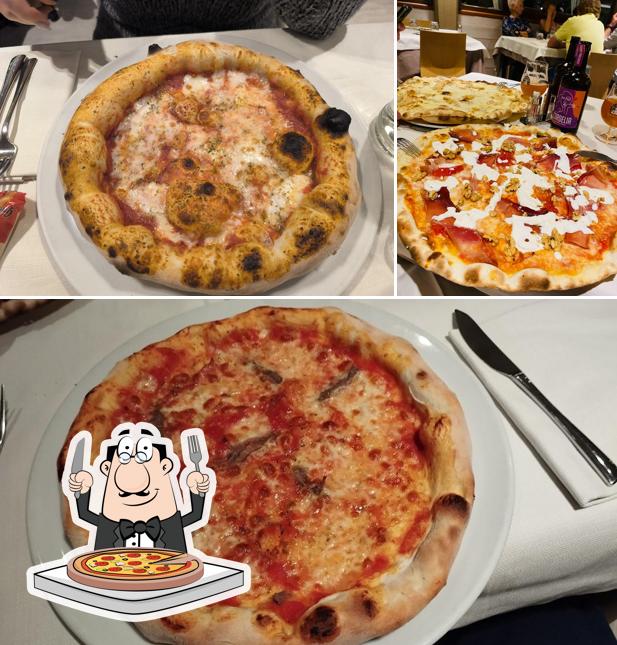 A Pizzeria Blu Notte Snc Dei F.lli Gherri Enrico e Mirella Correggio Reggio Emilia, puoi ordinare una bella pizza