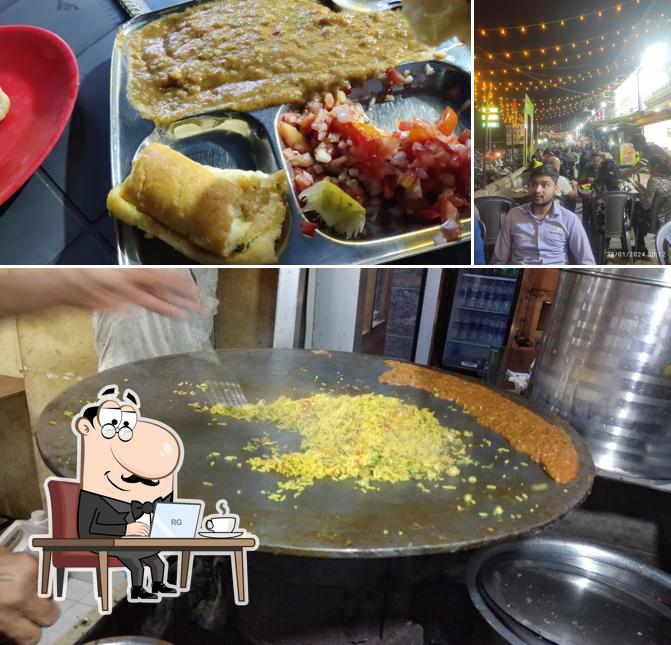 Check out the picture depicting interior and food at Novelty Pavbhaji center