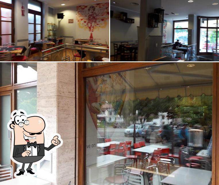 Dai un'occhiata agli interni di Tripoli Pizza e Ristorante