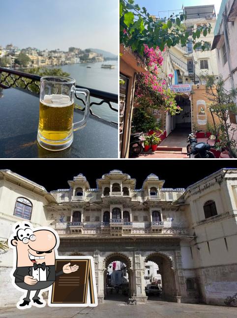 The photo of Dream Heaven Haveli-Pichola Lake/Lake View Cafe in Udaipur’s exterior and food