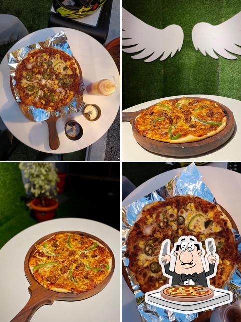 Try out pizza at Sparrows Rooftop Cafe