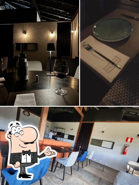 Dê uma olhada a foto mostrando interior e comida no Grado Bistrô