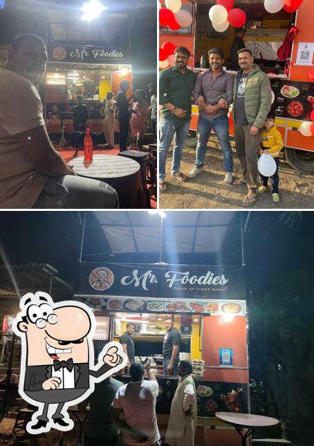 This is the image depicting interior and beverage at Mr. Foodie