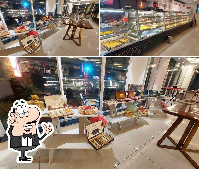 THE GHANSHYAM AMRITSAR MITHAIWALE - JALANDHAR is distinguished by interior and food