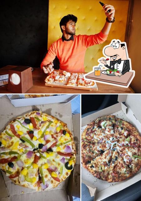 Check out the image depicting food and interior at Pizza Avenue