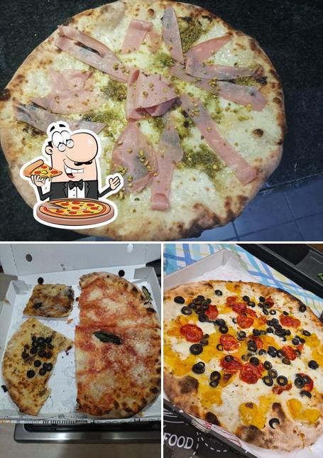 A Pizzeria Penna Bianca D'asporto e Domicilio, puoi assaggiare una bella pizza