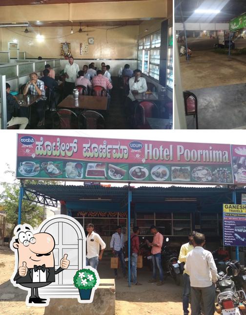 The image of exterior and interior at Hotel Purnima.Chikkodi