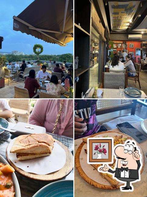 Take a seat at one of the tables at Tapri Central