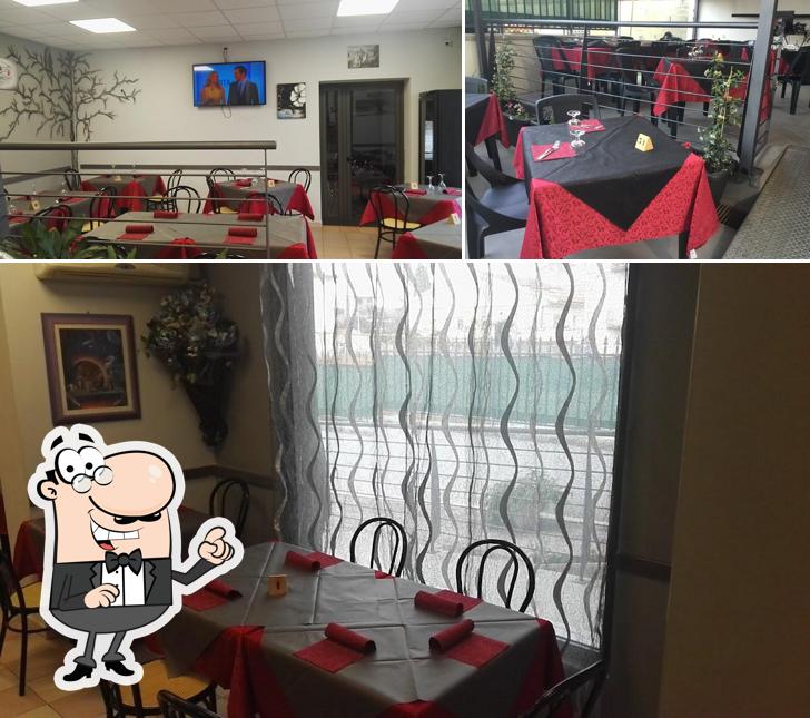 Dai un'occhiata agli interni di Il Pomodoro Pizzeria Ristorante