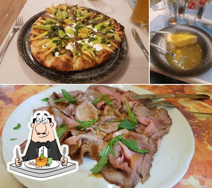 Tra le diverse cose da Osteria pizzeria Barbarossa si possono trovare la cibo e interni