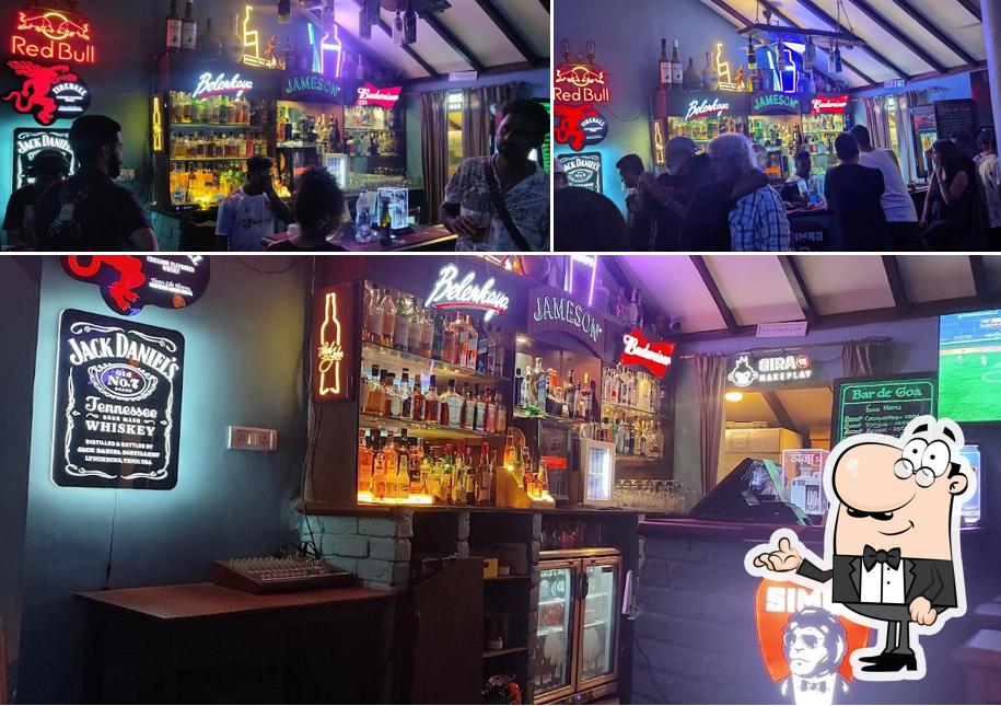 Take a seat at one of the tables at Bar De Goa