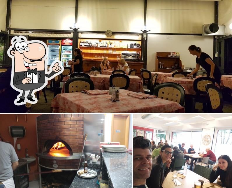 Dai un'occhiata agli interni di Pizzeria da Rida