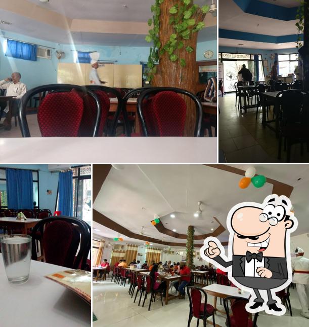Take a seat at one of the tables at Indian Coffee House District court Indore