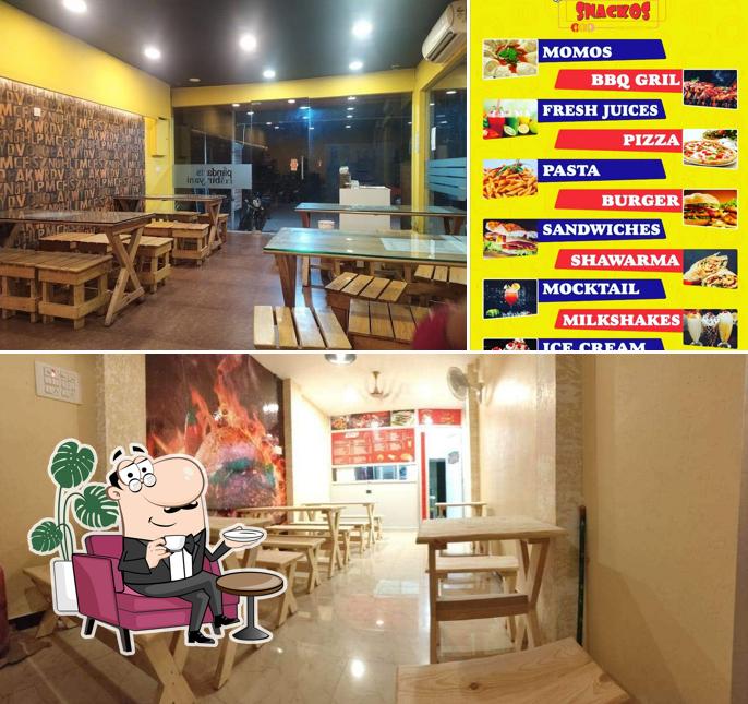 Take a seat at one of the tables at SNACKOS