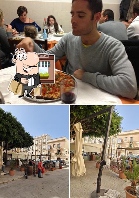 Guarda la immagine che presenta la esterno e tavolo da pranzo di Caffè Jolanda