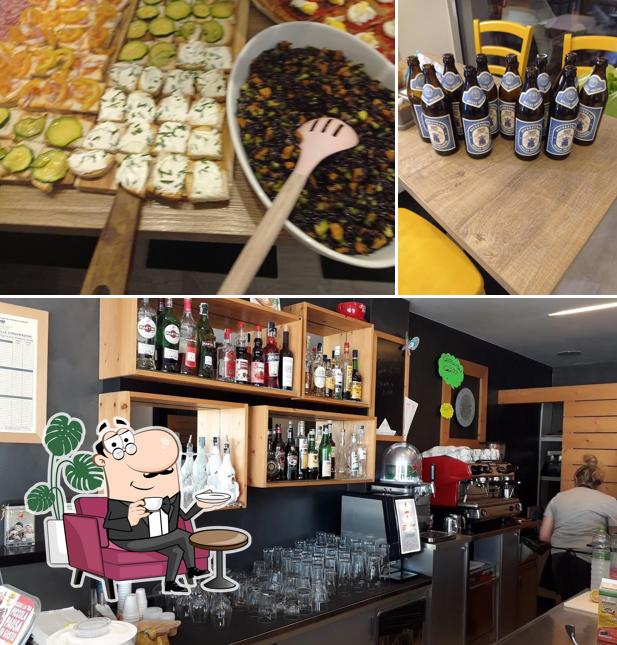 La immagine della interni e bancone da bar di Bodeguita cafe'