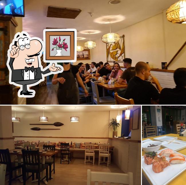 Sente em uma das mesas no Tropical sushi