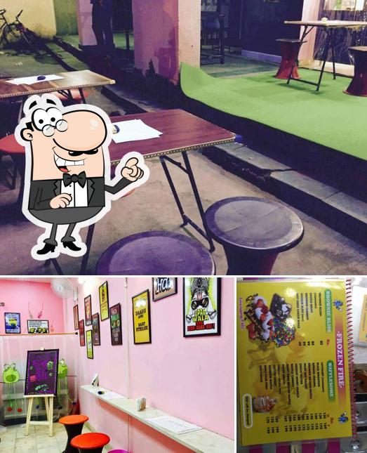 This is the picture showing interior and food at Fusion Ice Rolls