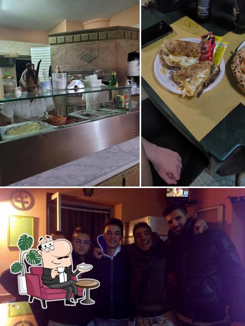 Dai un'occhiata agli interni di Pizzeria Le Querce di Mamre