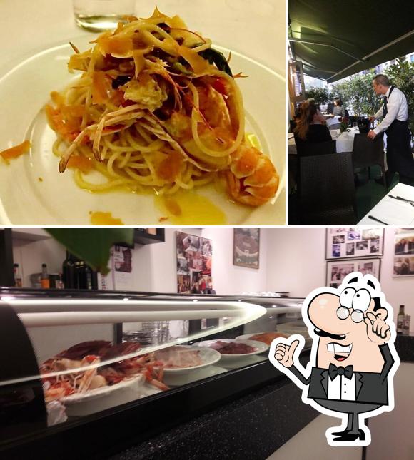 Questa è la immagine che presenta la interni e bevanda di Ristorante Da Gino Il Bonaparte