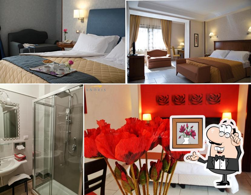 Siediti a un tavolo di Andris Hotel