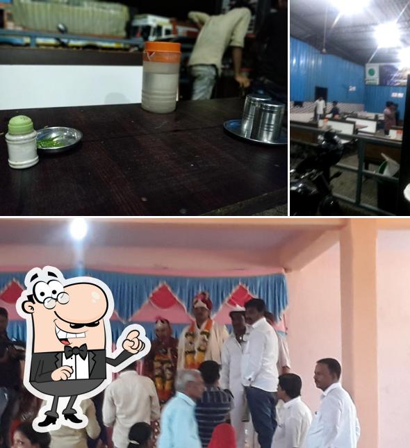 Take a seat at one of the tables at Hotel Himachal Punjab