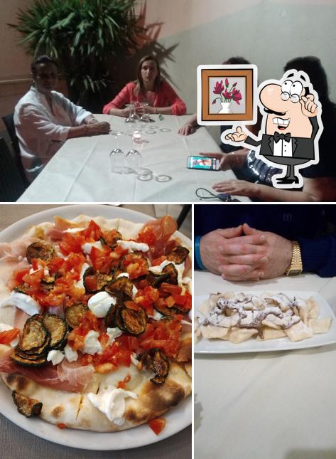 Dai un'occhiata agli interni di Pizzeria Mamma che Pizza
