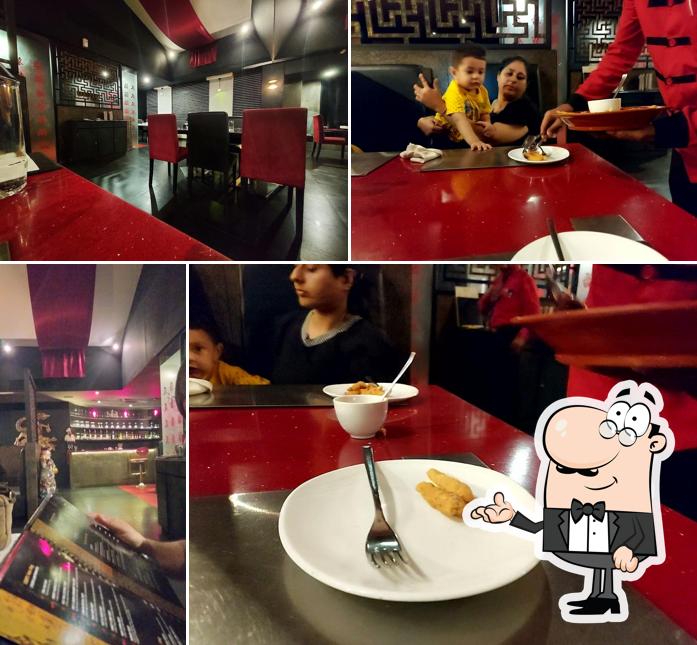 Take a seat at one of the tables at Chin Mi