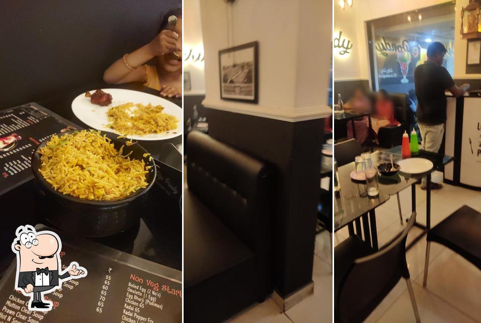 Take a seat at one of the tables at Heritage Pondy Restaurant