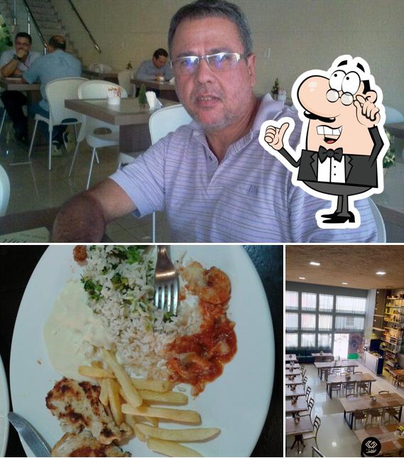 Confira a imagem mostrando interior e comida no Restaurante Comedoria Escritório