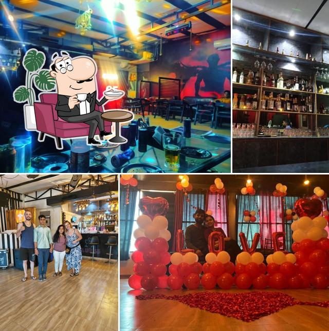 Take a seat at one of the tables at Club 65 The Restro & Bar