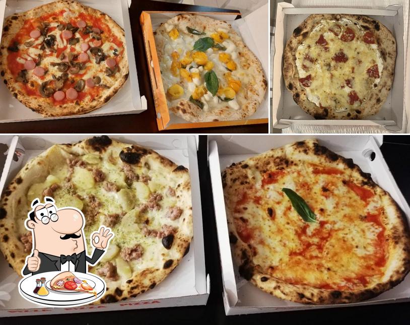 A La Bottega Della Pizza, puoi goderti una bella pizza