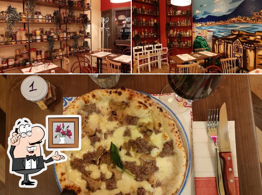 Guarda la immagine che raffigura la interni e pizza di Pizzium Roma - Via Ostiense