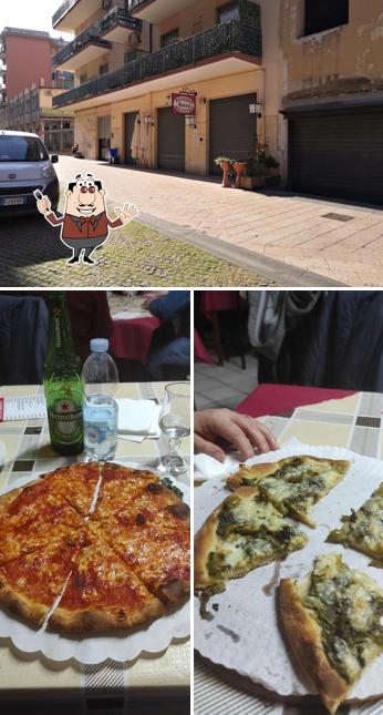 La immagine della cibo e esterno di Pizzeria Rosticceria Rocco