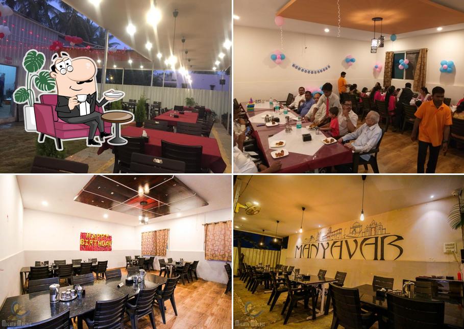 The interior of Hotel Manyavar Pure Veg Family Garden & Restaurant