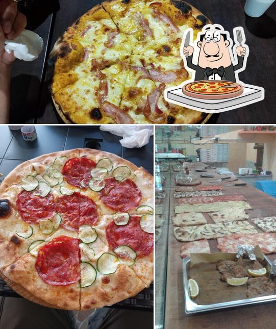 A 2 di Pizze - Pizzeria Pomezia, puoi goderti una bella pizza