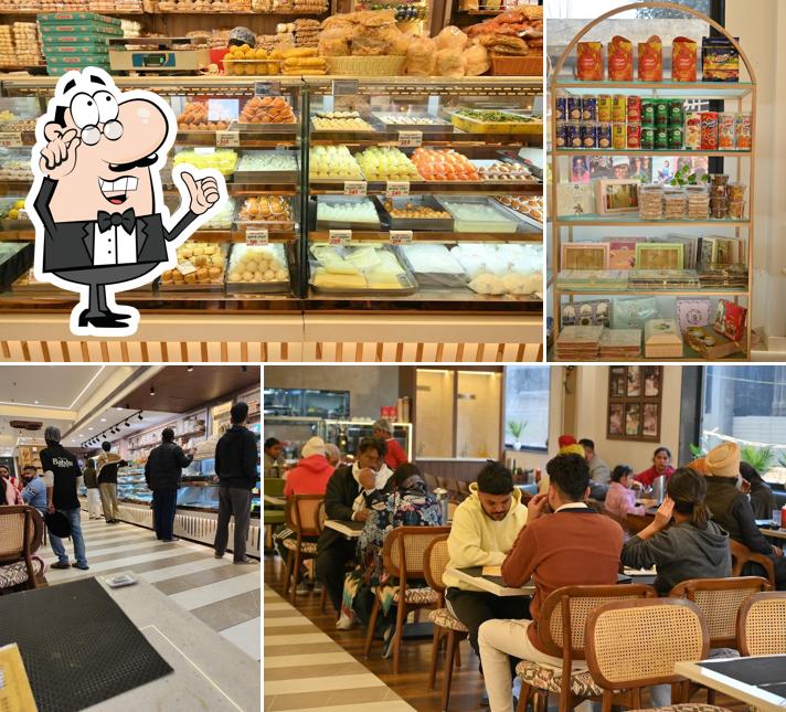 Take a seat at one of the tables at Bablu Sweets