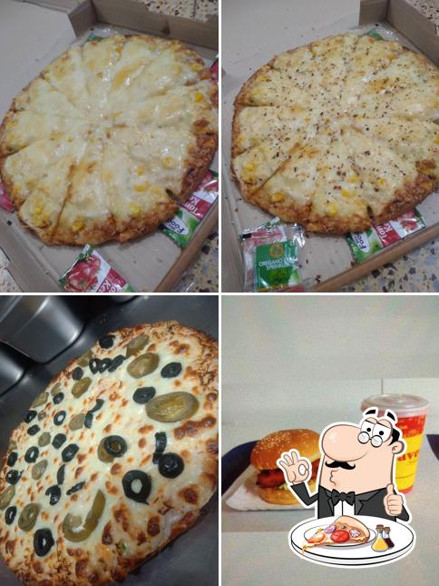 Order pizza at Heaven Pizza & Cafe (BY CAFE HEART SQUARE )