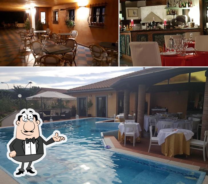 Questa è la immagine che mostra la interni e vino di Hotel La Pietra