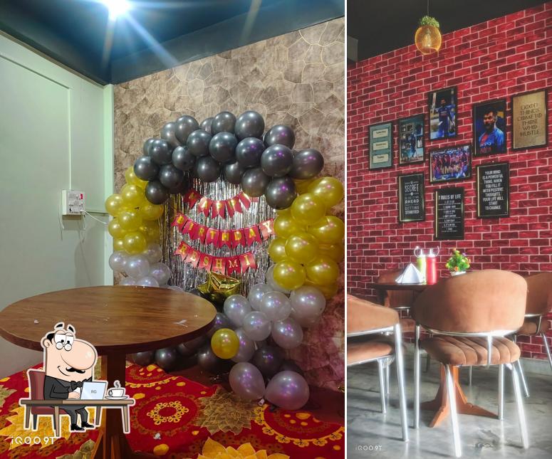 Take a seat at one of the tables at VINTAGE CAFE AND RESTAURANT