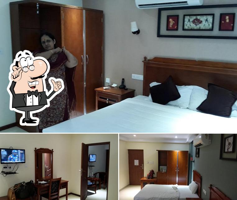 Take a seat at one of the tables at Athirappilly Residency