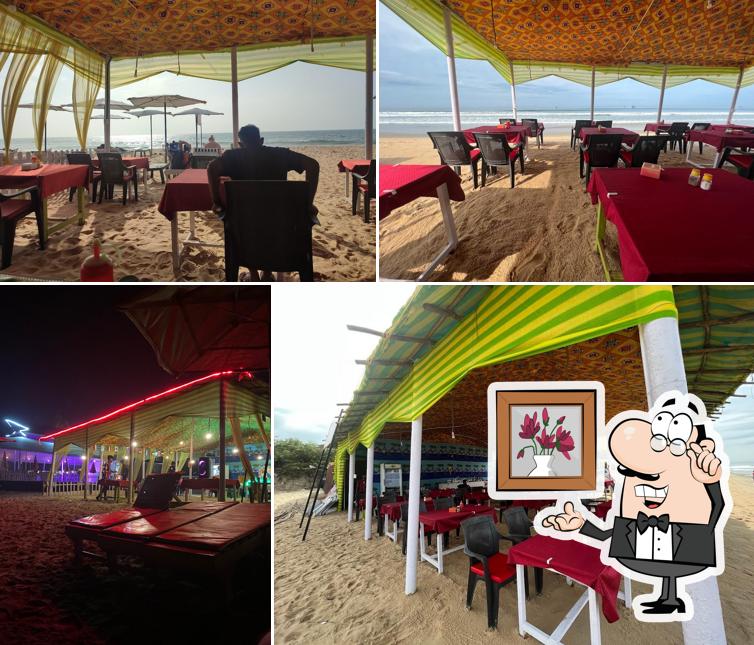 Take a seat at one of the tables at Jammy's beach shack