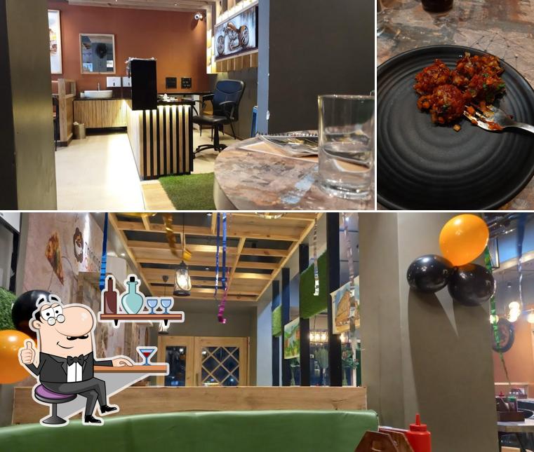 Take a look at the photo displaying interior and beverage at Thinking Cup Junagadh